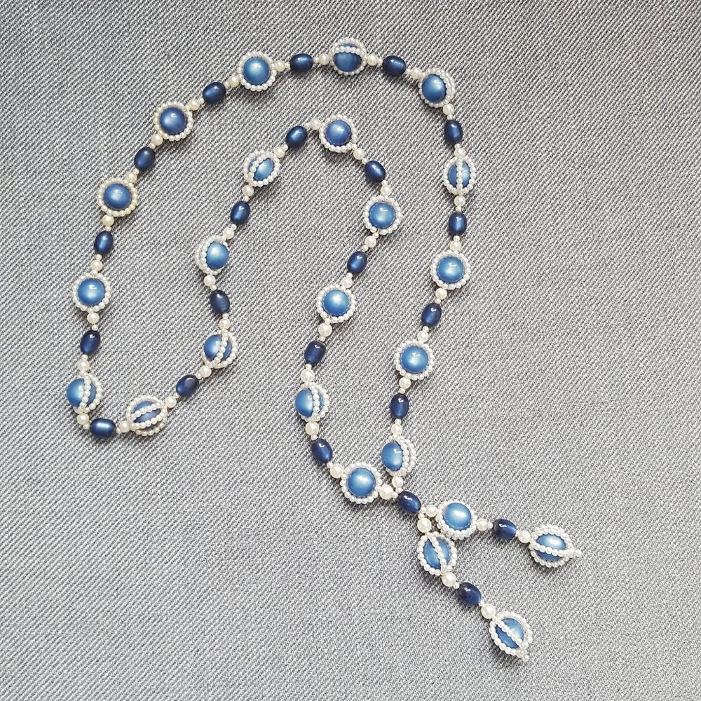 Vintage 70s Moonglow Lucite Tassel Necklace in Blue and Pearl White. Boho